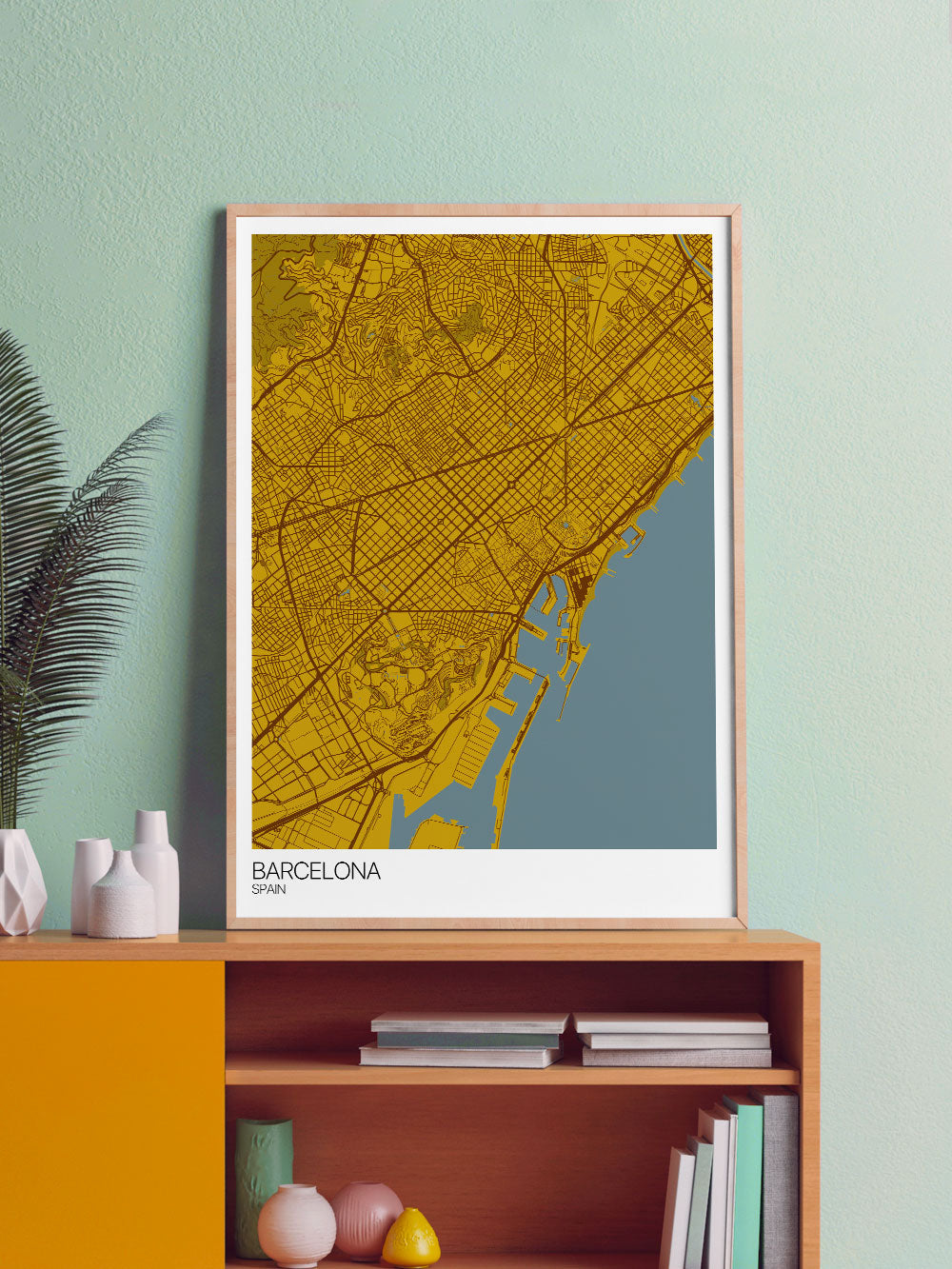 Barcelona City Map Wall Art in a frame on a shelf