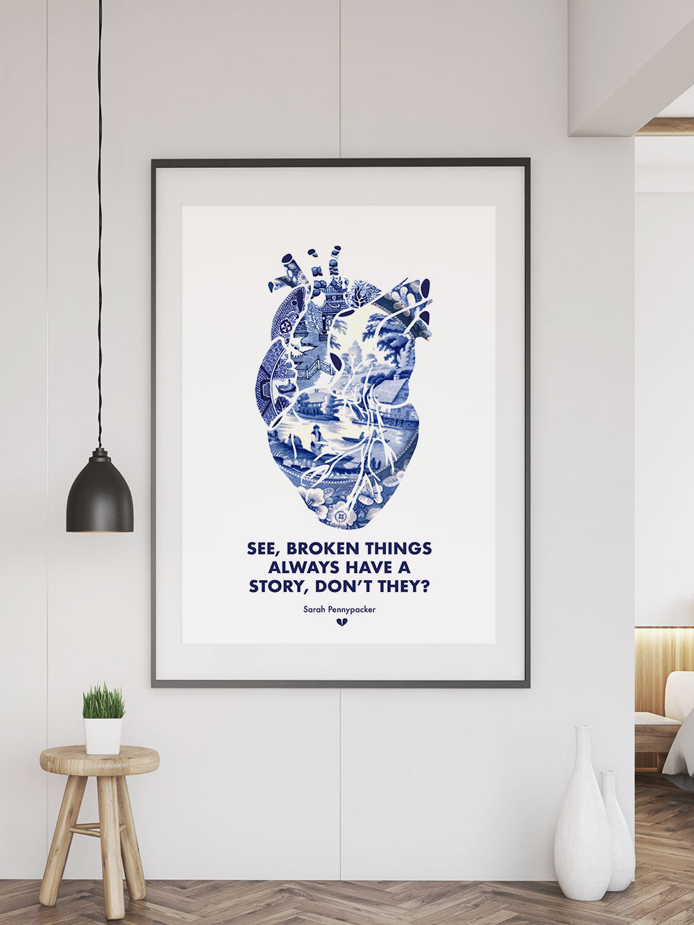 Broken Things Heart Print in a frame on a wall