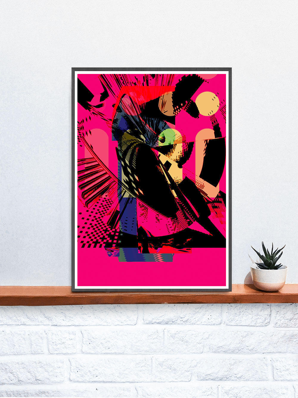 Glitch Cog Glitch Art Print in a frame on a shelf