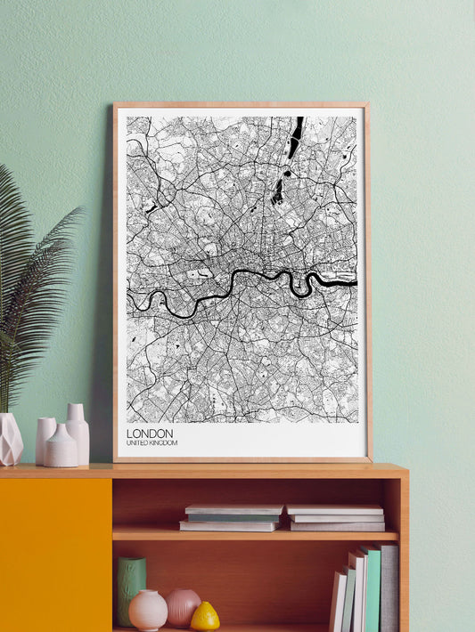 London City Map Drawing Print in a frame on a shelf