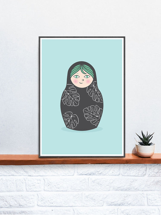 Matryoshka Monstera Russian Doll Art Print in a frame on a shelf