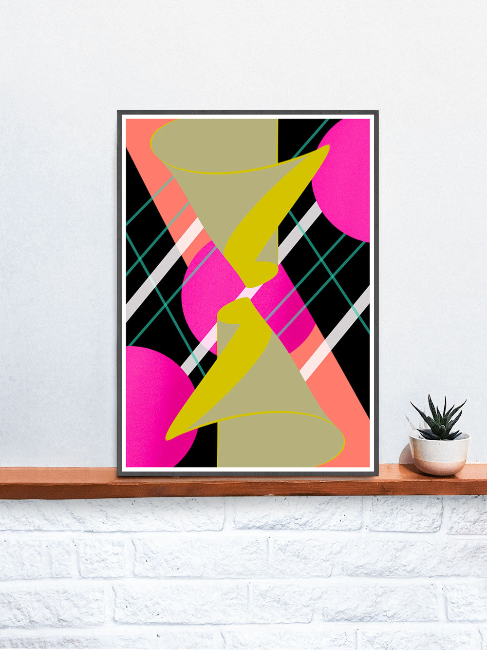 Mirrored Hugs Abstract Wall Art in a frame on a shelf