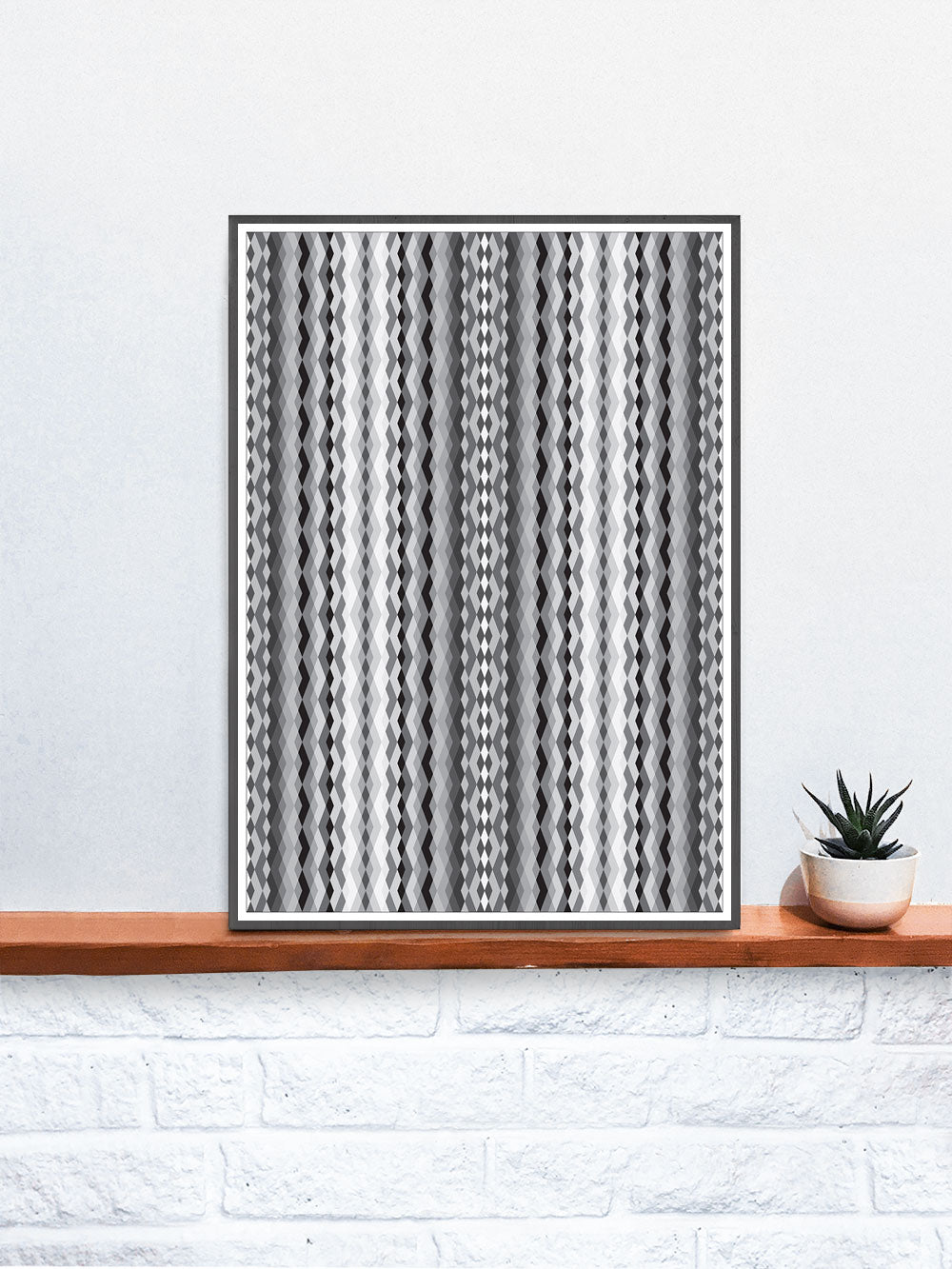 Monostatic Black and White Print in a frame on a shelf