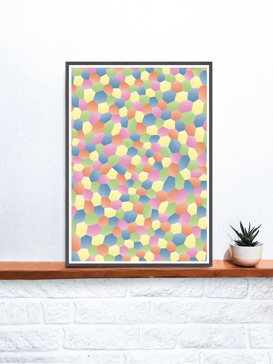 Rainbow Polygon Art in a frame on a shelf
