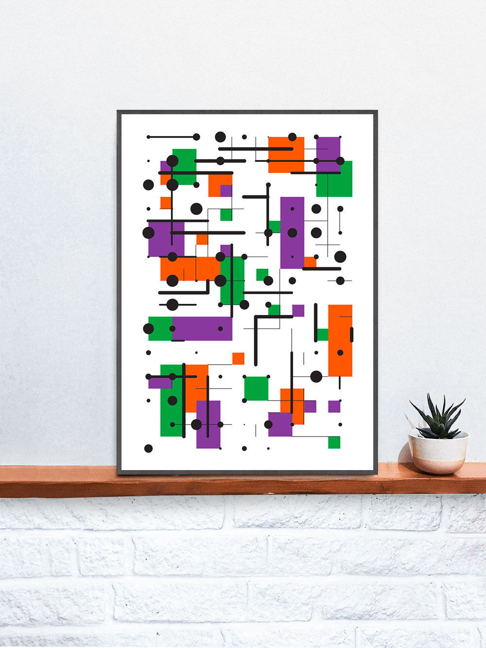 Secondary 10 Triangle Abstract Print in a frame on a shelf