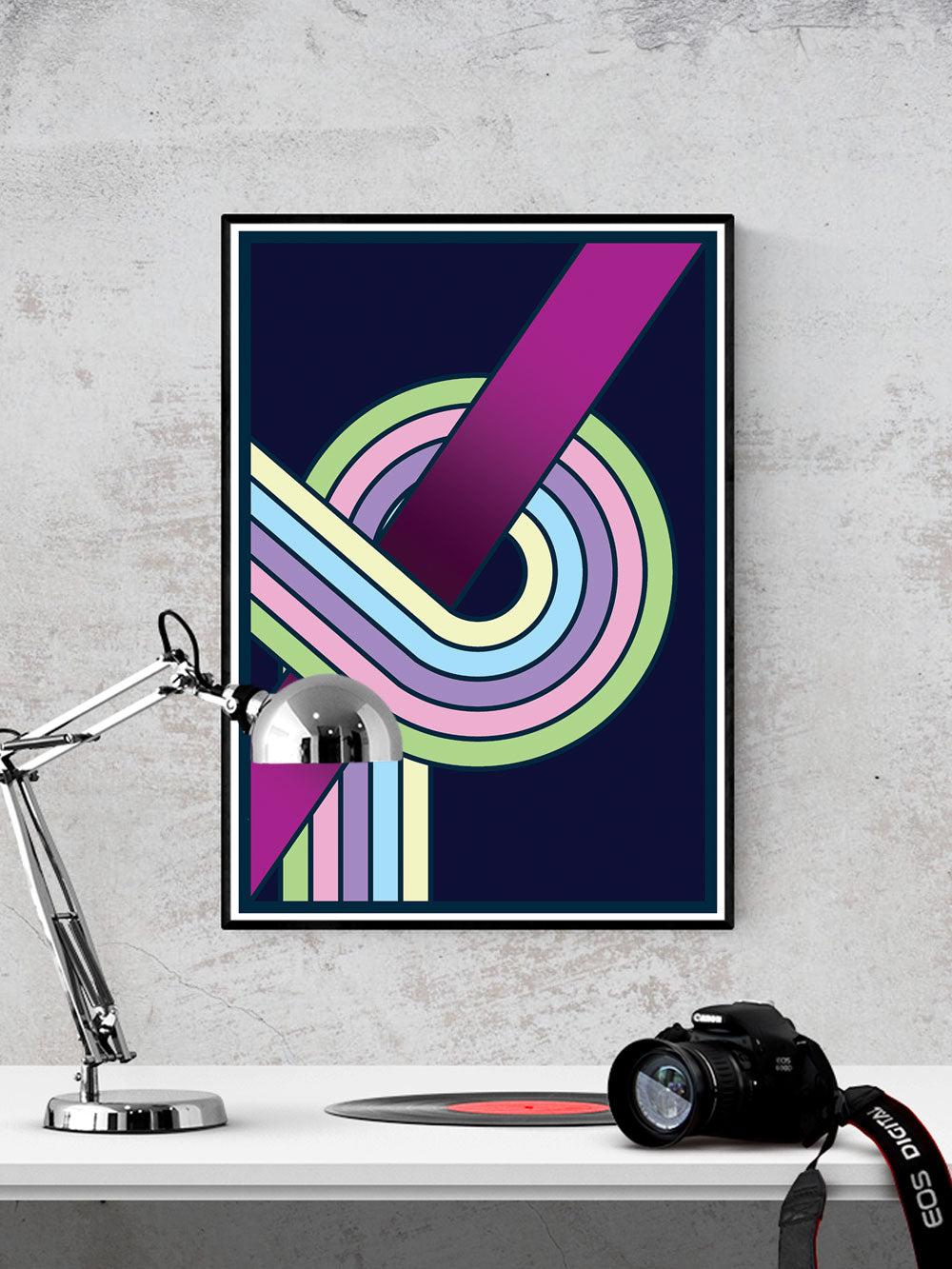 The Fluid 2 Retro Spiral Wall Art in a frame on a wall