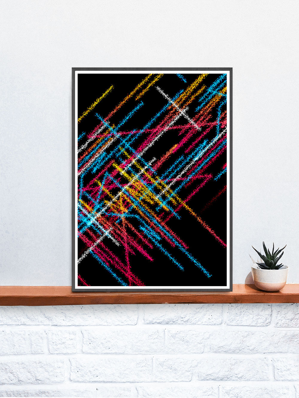 Tube Graffiti Abstract Art in a frame on a shelf
