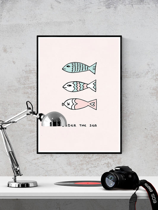 Under the Sea Fish Art Print in a frame on a wall