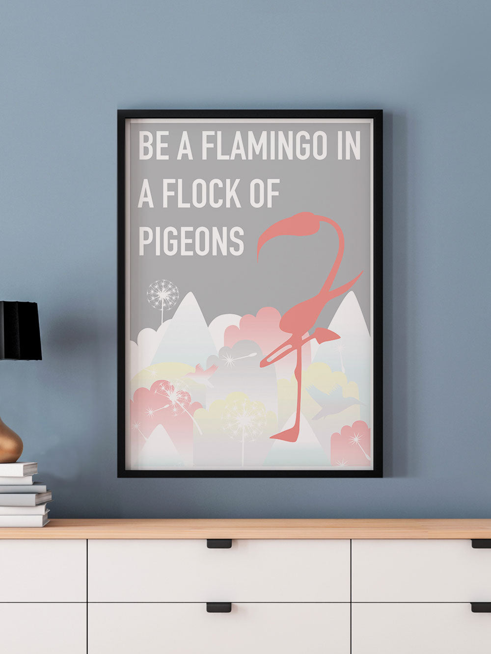 Be a Flamingo Bird Wall Art in a frame on a wall