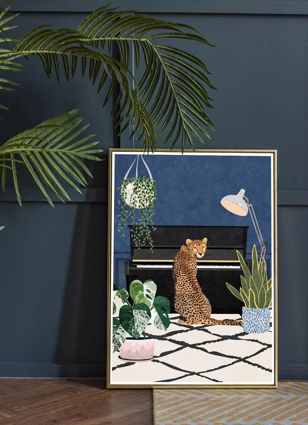 Cheetah Tunes Art Print by Sarah Manovski in a room with blue panelled wall and house plant