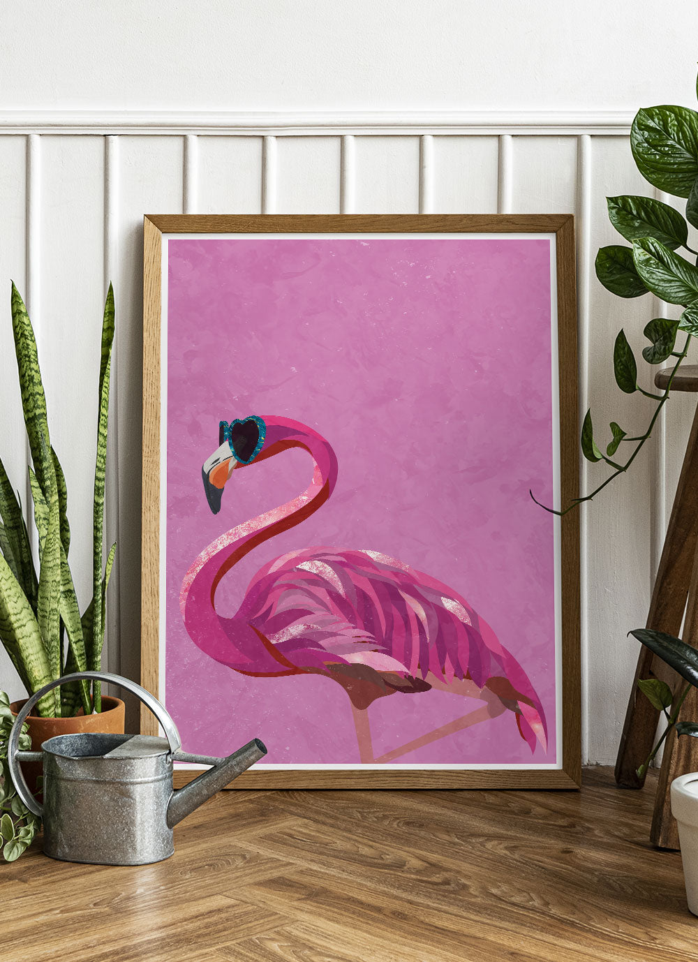 Funky Flamingo Art Print by Sarah Manovski in a clean room with house plants