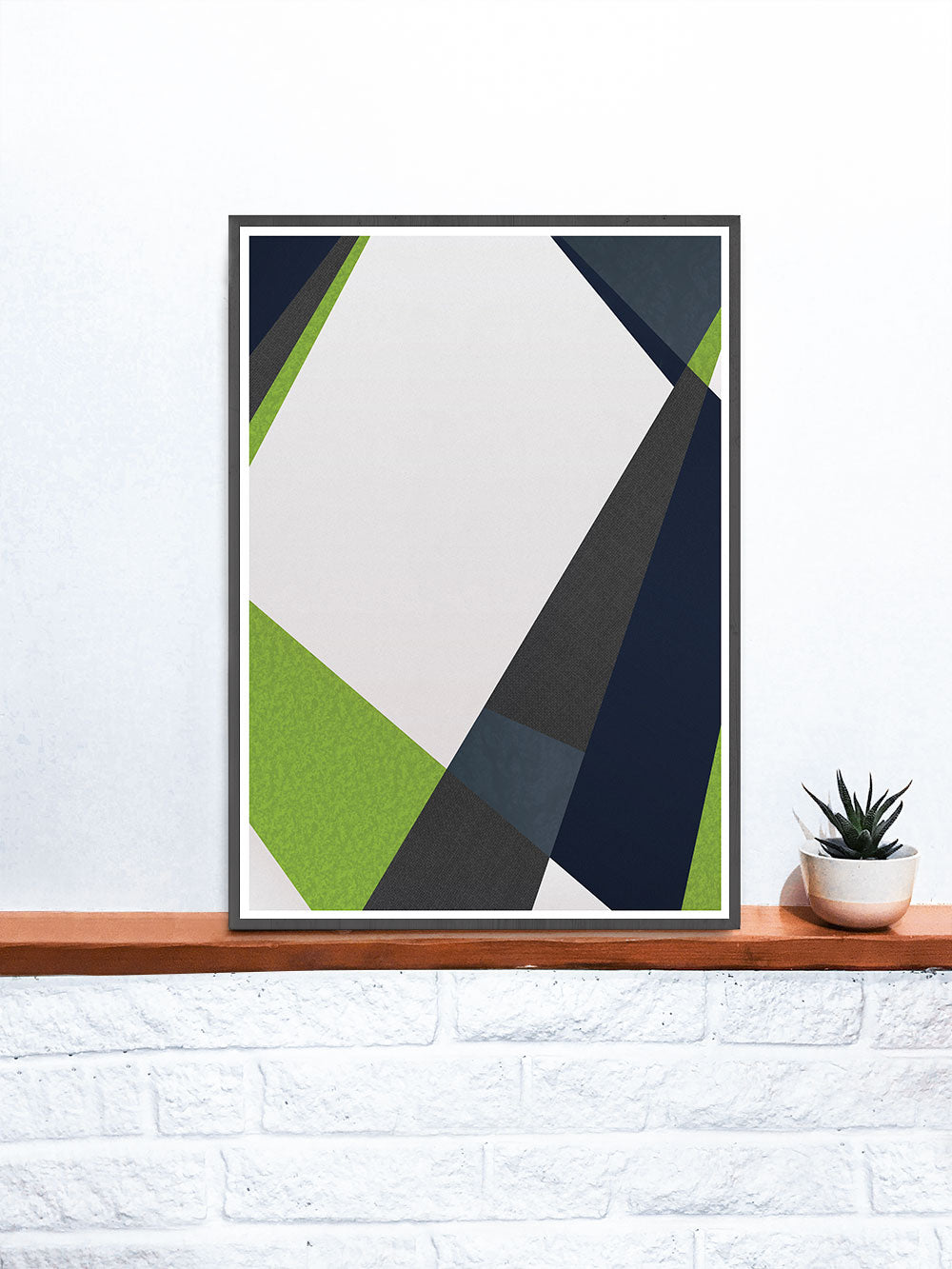 Green and Blue Geometric Print on a Shelf