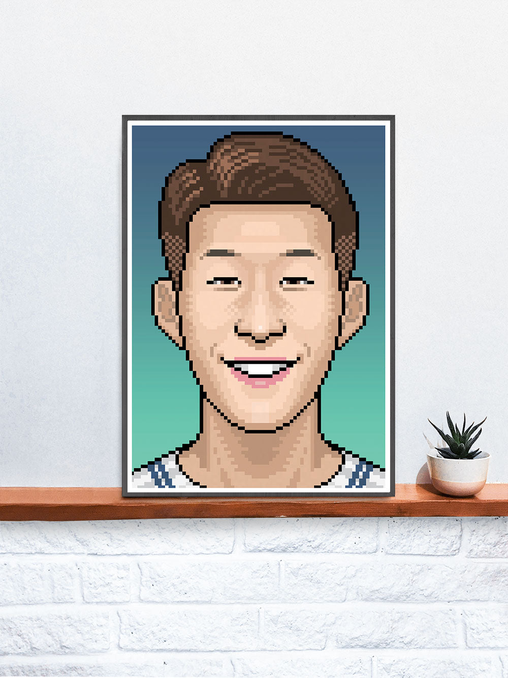 Heungmin Football Art Print in a frame on a shelf