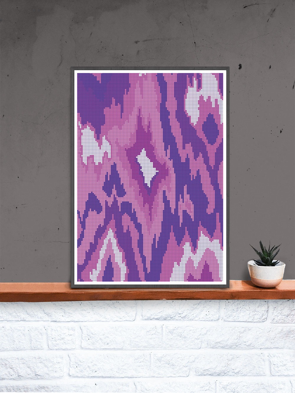 Ikat Abstract Textile Print in a frame on a shelf