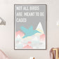Caged Bird Art Print in a frame on a wall