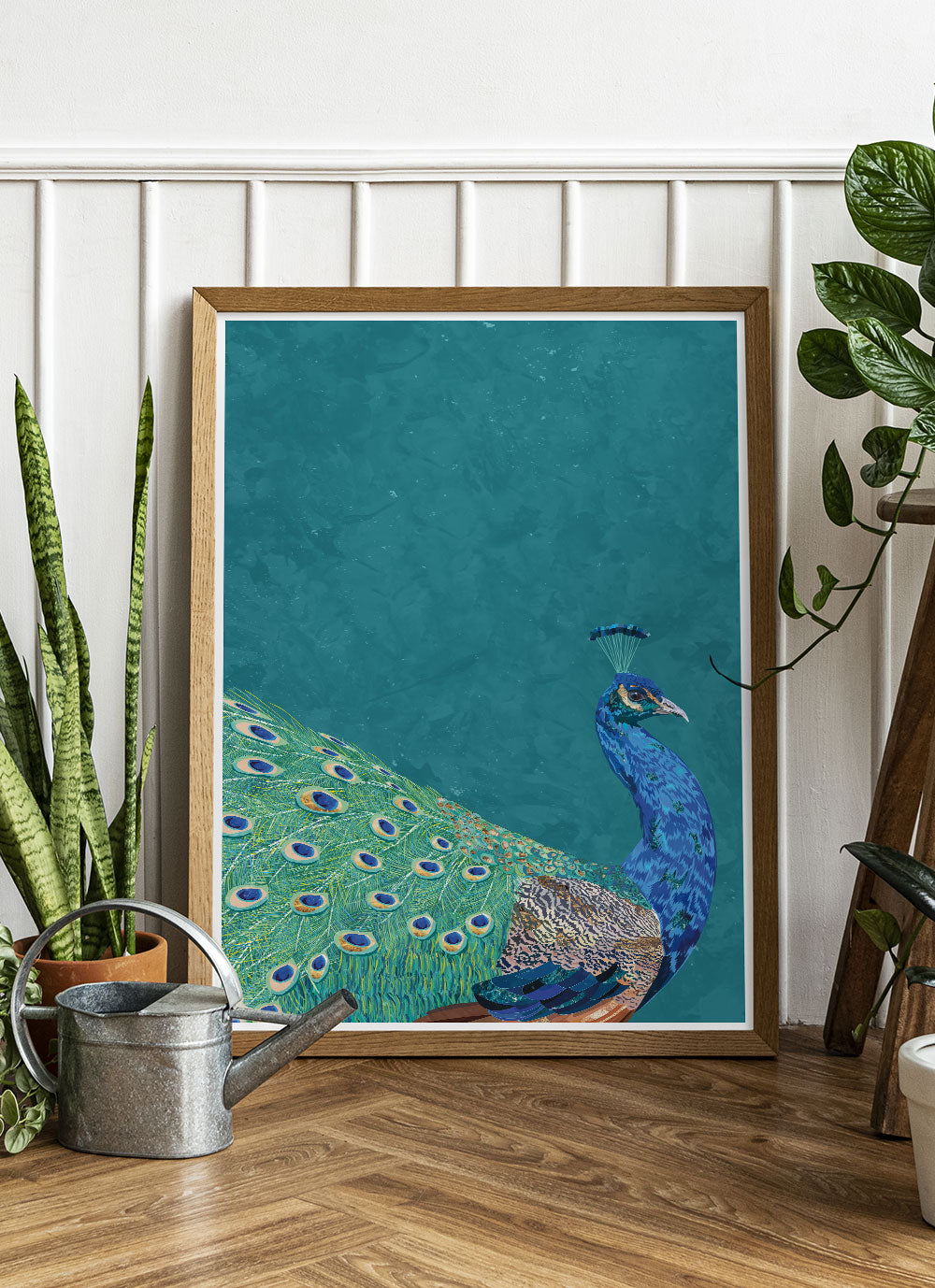Peacock Art Print by Sarah Manovski ina treny room with house plants