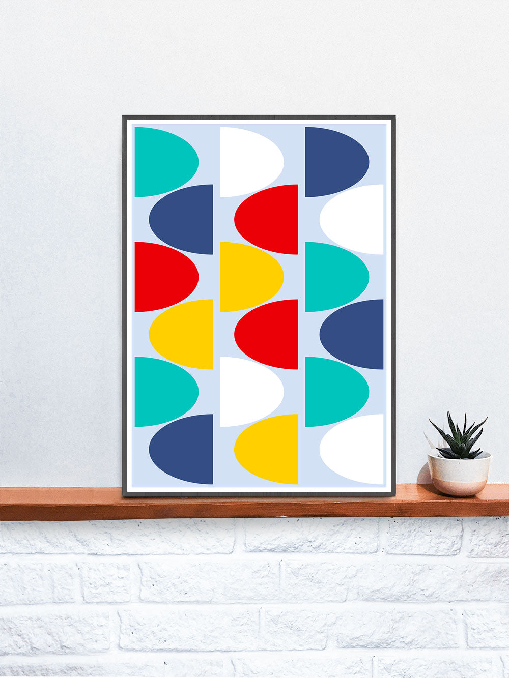 Pop Scales 1 Abstract Art Print in a frame on a shelf