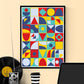 Pop Tones Shapes Abstract Art Print in a frame on a wall
