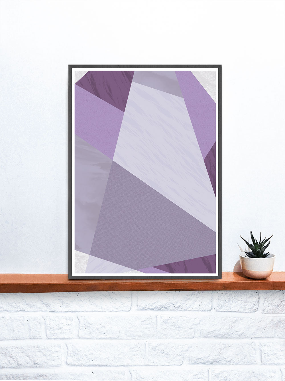 Purple Candy Purple Geometric Print in a frame on a shelf