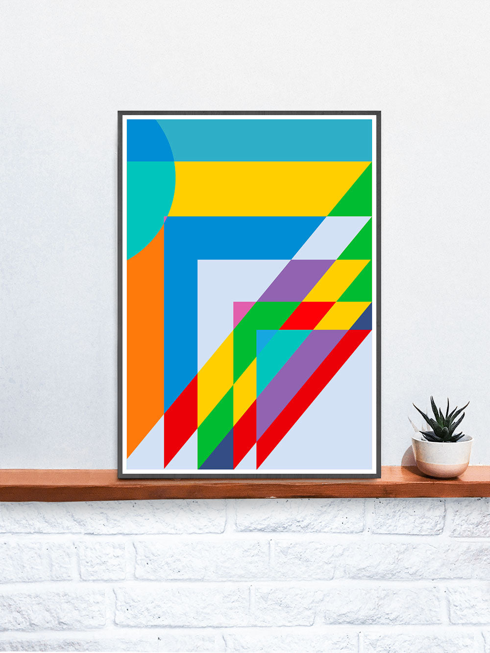 Sunday Morning Happy Days Geometric Shape Art in a frame on a shelf