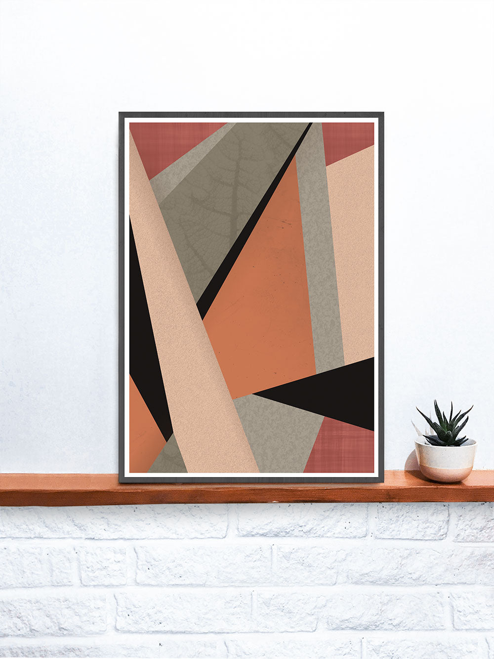 Terracota Tiles Geometric Triangle Print on a shelf