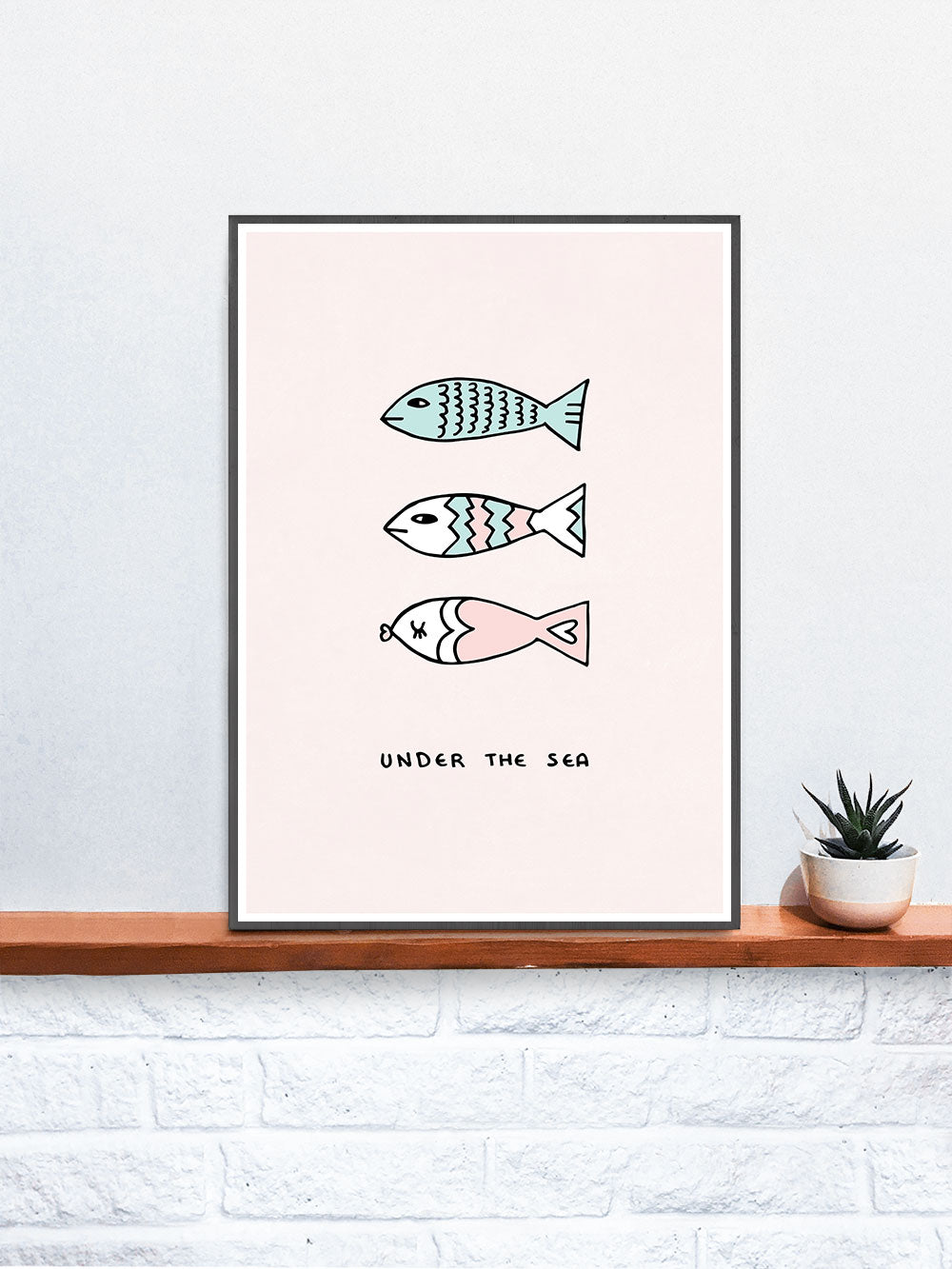 Under the Sea Fish Art Print  in a frame on a shelf